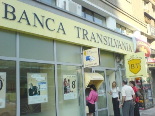 Banca Transilvania negociază achiziţia unei bănci